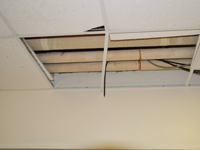 A man fell through the ceiling of an American store. He had been living there.