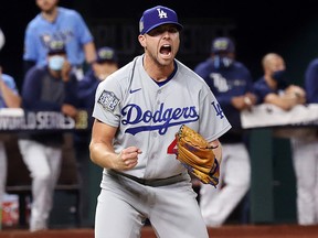 Blake Treinen of the Los Angeles Dodgers celebrates after striking out Willy Adames (not pictured) of the Tampa Bay Rays to secure the 4-2 victory in Game Five of the 2020 MLB World Series at Globe Life Field on October 25, 2020 in Arlington, Texas. (Rob Carr/Getty Images)