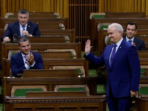 Conservative Party leader Erin O'Toole rises to vote in the House of Commons on Parliament Hill in Ottawa, Wednesday, Oct. 21, 2020.