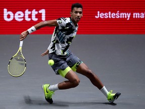 Felix Auger-Aliassime plays a backhand during the final at the Bett1Hulks Indoor tournament at Lanxess Arena on October 18, 2020 in Cologne, Germany.