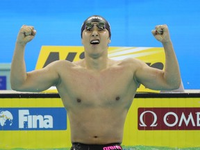 Daiya Seto of Japan celebrates victory after his competes in the Men's 200m Butterfly Final of the 14th FINA World Swimming Championships at Hangzhou Olympic Sports Expo on day one on December 11, 2018 in Hangzhou, China.