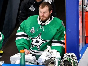Anton Khudobin of the Dallas Stars looks on from the bench against the Tampa Bay Lightning during the third period in Game Three of the 2020 NHL Stanley Cup Final at Rogers Place on Sept. 23, 2020 in Edmonton.