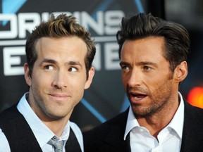Cast members Ryan Reynolds and Hugh Jackman arrive for the Los Angeles industry screening of "X-Men Origins-Wolverine" at Grauman's Chinese Theater in Hollywood, California, on April 28, 2009.