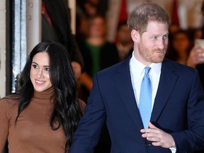 Britain's Prince Harry and his wife Meghan, Duchess of Sussex, leave Canada House in London  January 7, 2020.