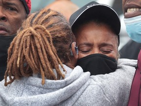 Sherrellis Stinnette, the grandmother of 19-year-old Marcellis Stinnette, joins demonstrators protesting the police shooting that left her grandson dead and his girlfriend, 20-year-old Tafara Williams, with serious injuries on October 22, 2020 in Waukegan, Illinois.