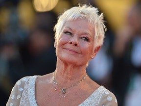 British actress Judi Dench arrives for the screening of "Philomena" at the 70th Venice Film Festival on August 31, 2013 at Venice Lido.