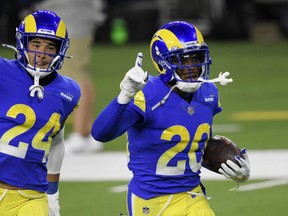 Rams cornerback Jalen Ramsey (20) celebrates after intercepting Bears quarterback Nick Foles during second half action at SoFi Stadium in Inglewood, Calif., Monday, Oct. 26, 2020.