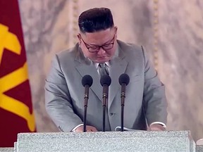 North Korean Leader Kim Jong Un reacts during a speech at a military parade in this still image taken from video on October 12, 2020.
