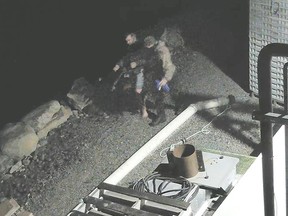 Yarmouth County RCMP have released photos, one is shown in this handout image, and video of persons of interest as they continue to investigate a suspicious fire that occurred at a fish plant in Middle West Pubnico, N.S.