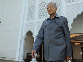 Malaysia's former Prime Minister, Mahathir Mohamad, leaves after an interview with Reuters in Kuala Lumpur, Malaysia, October 16, 2020.
