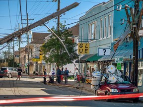 A car crushed by fallen transformers is seen after Hurricane Zeta swept through New Orleans, October 29, 2020.