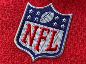 The official NFL logo is seen on the back of a hat in Los Angeles, July 21, 2020.