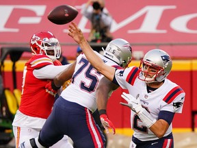 New England Patriots quarterback Brian Hoyer (2) throws a pass against the Kansas City Chiefs at Arrowhead Stadium.