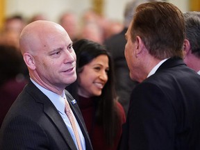 In this file photo taken on January 15, 2020 Chief of Staff to the Vice President Marc Short (left) is seen during a ceremony in the East Room of the White House in Washington.