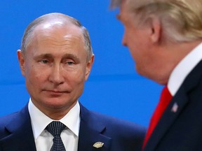 Russia's President Vladimir Putin and U.S. President Donald Trump are seen during the G20 summit in Buenos Aires, Argentina November 30, 2018.