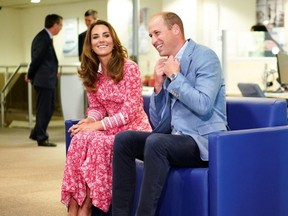 Britain's Catherine, Duchess of Cambridge (left) and Prince William, Duke of Cambridge (right), meet with people looking for work at the London Bridge Jobcentre, in London, Sept. 15, 2020.