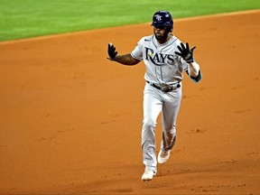 Tampa Bay Rays' Randy Arozarena rounds the bases after hitting a home run during the first inning against the Los Angeles Dodgers during Game 6 of the World Series at Globe Life Field in Arlington, Texas, on Tuesday, Oct. 27, 2020.