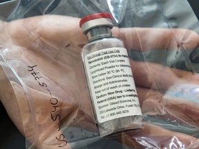 In this file photo taken on April 8, 2020 one vial of the drug Remdesivir is seen during a press conference in Hamburg, northern Germany, amidst the new coronavirus COVID-19 pandemic.