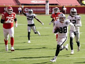 Raiders strong safety Jeff Heath (38) carries the ball on a 47-yard interception return in the fourth quarter against the Chiefs at Arrowhead Stadium in Kansas City, Mo., Oct. 11, 2020.