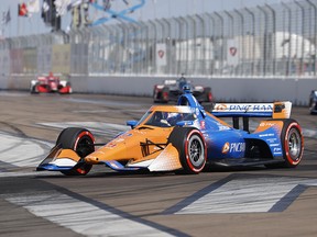 Chip Ganassi Racing driver Scott Dixon (9) of New Zealand enters the first turn during the Firestone Grand Prix on the Streets of St. Petersburg.