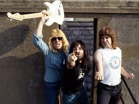 Parody English heavy metal band, Spinal Tap (L-R;  Michael McKean (David St. Hubbins), Harry Shearer (Derek Smalls), and Christopher Guest (Nigel Tufnel), in 1984.