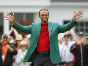 Tiger Woods smiles after winning the Masters at Augusta National Golf Club on April 14, 2019 in Augusta, Georgia.