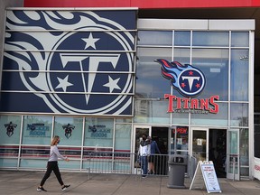 Tennessee Titans fans make their way in and out of the Titans Team Store on the originally scheduled day of a game between the Titans and the Pittsburgh Steelers.
