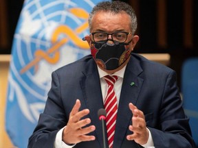This handout picture taken and released by the World Health Organization on Monday, Oct. 5, 2020 shows WHO Director-General Tedros Adhanom Ghebreyesus wearing a protective face mask attending a WHO executive board special session on the COVID-19 response at the health agency's headquarters in Geneva.