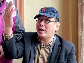 Australian writer Yang Hengjun is seen in Tibet Autonomous Region, China, July 2014 in this still photo taken from video.