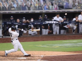 Gleyber Torres of the New York Yankees hits a two-run home run against the Tampa Bay Rays in the sixth inning of Game 4 of the American League Division Series at PETCO Park on Oct. 8, 2020 in San Diego, Calif.