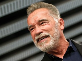US actor and former governor of California Arnold Schwarzenegger smiles as he attends a street marketing event ahead of the fitness and bodybuilding Arnold Classic Europe event in L'Hospitalet del Llobregat on September 28, 2018.