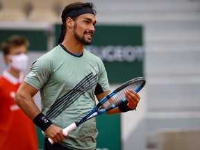 Italy's Fabio Fognini reacts as he plays against Kazakhstan's Mikhail Kukushkin during their men's singles first round tennis match at the Simonne Mathieu court on Day 2 of The Roland Garros 2020 French Open tennis tournament in Paris on September 28, 2020.