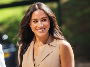 In this file photo taken on October 01, 2019 Meghan Markle, the Duchess of Sussex arrives at the University of Johannesburg, South Africa.