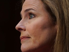 Supreme Court nominee Judge Amy Coney Barrett listens during the second day of her Senate Judiciary committee confirmation hearing on Capitol Hill on October 13, 2020 in Washington, DC.