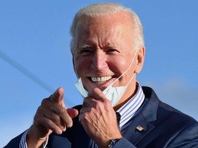 Democratic presidential nominee and former Vice President Joe Biden speaks at a Drive-In event with Bon Jovi at Dallas High School, Pennsylvania, on October 24, 2020.