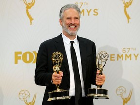 Jon Stewart holds his awards for Outstanding Writing For A Variety Series and Outstanding Variety Talk Series for Comedy Central's "The Daily Show With Jon Stewart" during the 67th Primetime Emmy Awards in Los Angeles, California September 20, 2015.