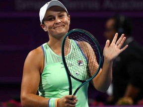 Ashleigh Barty of Australia celebrates winning match point against Laura Siegemund of Germany during Day 3 of the WTA Qatar Total Open 2020 at Khalifa International Tennis and Squash Complex on Feb. 25, 2020 in Doha, Qatar, Feb. 25, 2020.