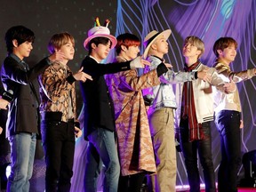 Members of South Korean boy band BTS pose on the red carpet during the annual MAMA Awards at Nagoya Dome in Nagoya, Japan, December 4, 2019.