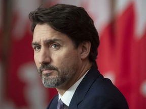 Prime Minister Justin Trudeau looks around the room during a news conference, Friday, Oct. 23, 2020 in Ottawa.