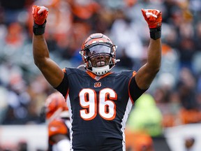 Cincinnati Bengals defensive end Carlos Dunlap (96) reacts during a game against the New York Jets, Sunday, Dec. 1, 2019, in Cincinnati.