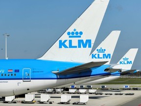 KLM airline airplanes are seen parked, as Schiphol Airport reduces its flights due to the coronavirus disease (COVID-19) outbreak, in Amsterdam, Netherlands April 2, 2020.