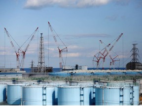 The reactor units No.1 to 4 are seen over storage tanks for radioactive water at Tokyo Electric Power Co's (TEPCO) tsunami-crippled Fukushima Daiichi nuclear power plant in Okuma town, Fukushima prefecture, Japan February 18, 2019.