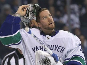 Calgary Flames have signed former Vancouver Canucks goaltender Jacob Markstrom.