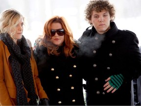 Lisa Marie Presley, with her children Riley and Benjamin Keough, attend the 75th birthday celebration for Elvis Presley in Memphis, Jan. 8, 2010.