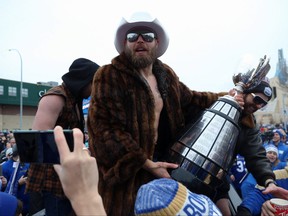 Former Blue Bombers quarterback Chris Streveler celebrates during the Grey Cup parade on Nov. 26. Streveler turned the celebrations up a notch during an Instagram Live chat set up by the team on Wednesday.
