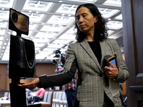Chief Public Health Officer Dr. Theresa Tam leaves a news conference on COVID-19 in Ottawa, March 23, 2020.