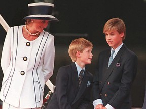 In this file photo, Princess Diana, her sons Harry (middle) and William watch the parade march past as part of the commemorations of VJ Day in London.
