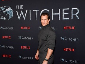 HOLLYWOOD, CALIFORNIA - DECEMBER 03: Henry Cavill attends the photocall for Netflix's "The Witcher" season 1 at the Egyptian Theatre on December 03, 2019 in Hollywood, California.