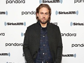 Charlie Hunnam poses for a photo as Andy Cohen sits down with the cast of 'The Gentlemen' on his SiriusXM Channel Radio Andy at SiriusXM Studios on January 13, 2020 in New York City.