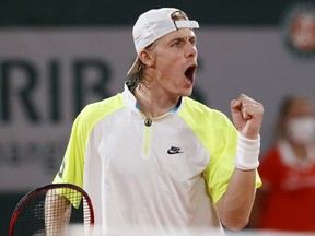 Denis Shapovalov of Canada celebrates after winning a point during his Men's Singles first round match against Gilles Simon of France on day three of the 2020 French Open at Roland Garros on September 29, 2020 in Paris, France.